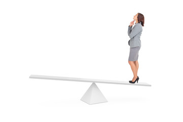 Composite image of focused businesswoman on scales against white background