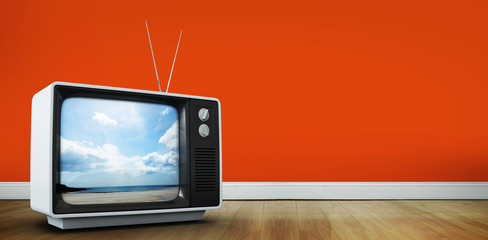 Retro television  against beach