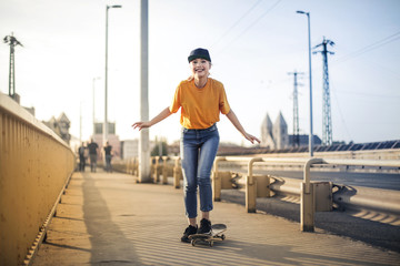 Happy teenager skating