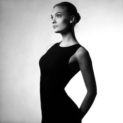 Elegant young girl in a black dress