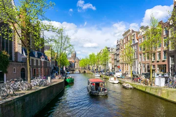 Tuinposter Colorful traditional old buildings in sunshine day at Amsterdam, Netherlands © Southtownboy Studio