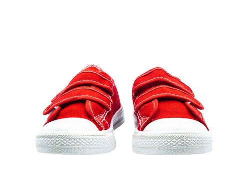 Fashion for kids. Sneakers red thick fabric. Isolated on white background.