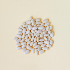 Organic  small white beans and lentils. Concept- healthy food, vegetarianism, observance of religious fasting.