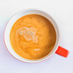  Iced coffee or caffe latte top view close up on white background. Concept of cold drinks.