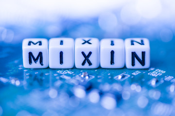 Word MIXIN formed by alphabet blocks on mother cryptocurrency