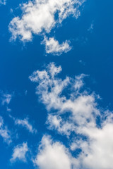 Fototapeta na wymiar Blue summer sky with white clouds