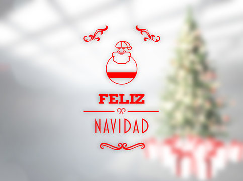 Feliz navidad banner against blurry christmas tree in room