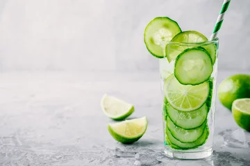  Infused detox water with  cucumber and lime. © nblxer