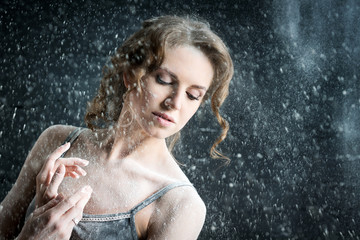 portrait of girl ballet dancer in the dust cloud