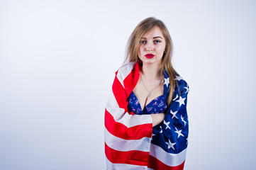 Cute girl in bra with american usa flag isolated on white background.