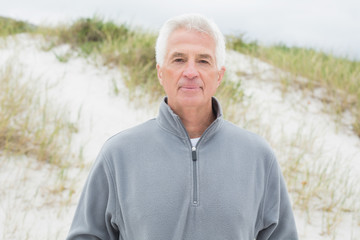 Portrait of a handsome senior man at beach