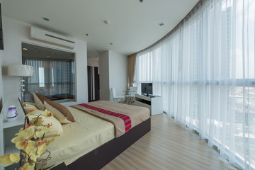 Bedroom interior. Modern bedroom in luxury apartment.