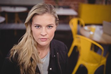 Portrait of confident young blond woman
