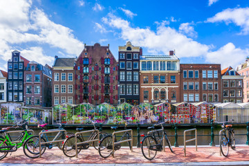 Fototapeta premium Colorful traditional old buildings in sunshine day at Amsterdam, Netherlands