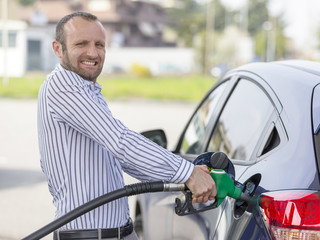 Unhappy man at the gas station