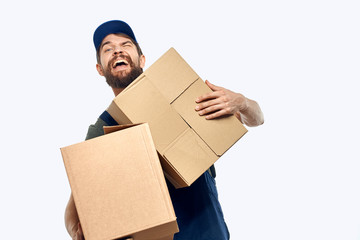 courier with boxes on bright background