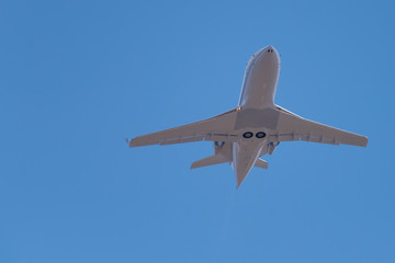 Fototapeta na wymiar Buisness jet in the blue sky