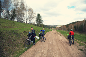 Fototapeta premium group of tourists in a hike on bicycles