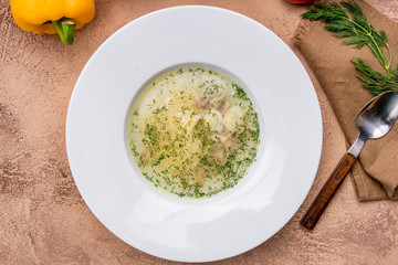 Chicken soup bouillon in a plate