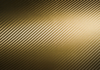 Metallic shiny texture of gold carbon fiber self-adhesive paper. Material for racing car...