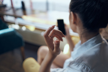 woman using smartphone in city