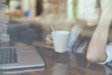 woman with cup of coffee