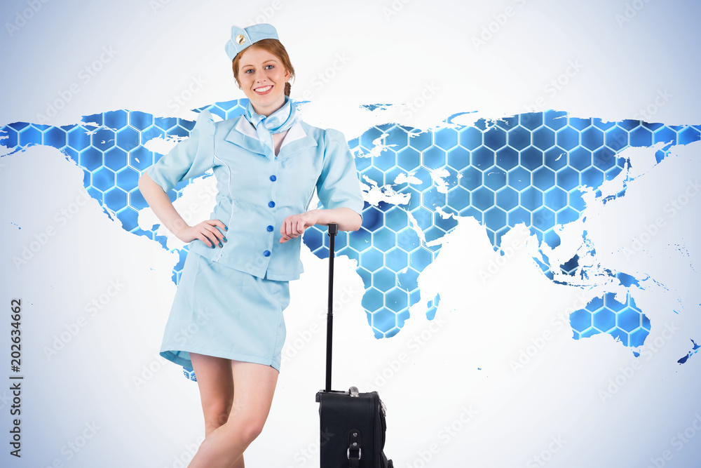 Poster pretty air hostess smiling at camera against background with hexagons and world map