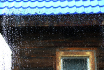 Summer rain outside the window drops on the window