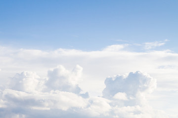 Large white Cumulus clouds on blue sky