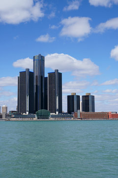 Detroit Renaissance Center during a beautiful day view from Windsor, Ontario, Canada.                            