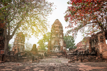 Aged abandon temple and buddha in Ayutthaya, the national historical place of Thailand.