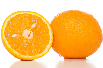 Naklejka na ściany i meble Orange and slice of orange on white background
