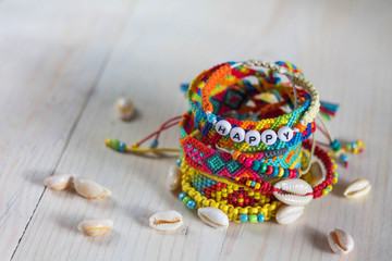 Fototapeta na wymiar handmade bracelets with beads and shells