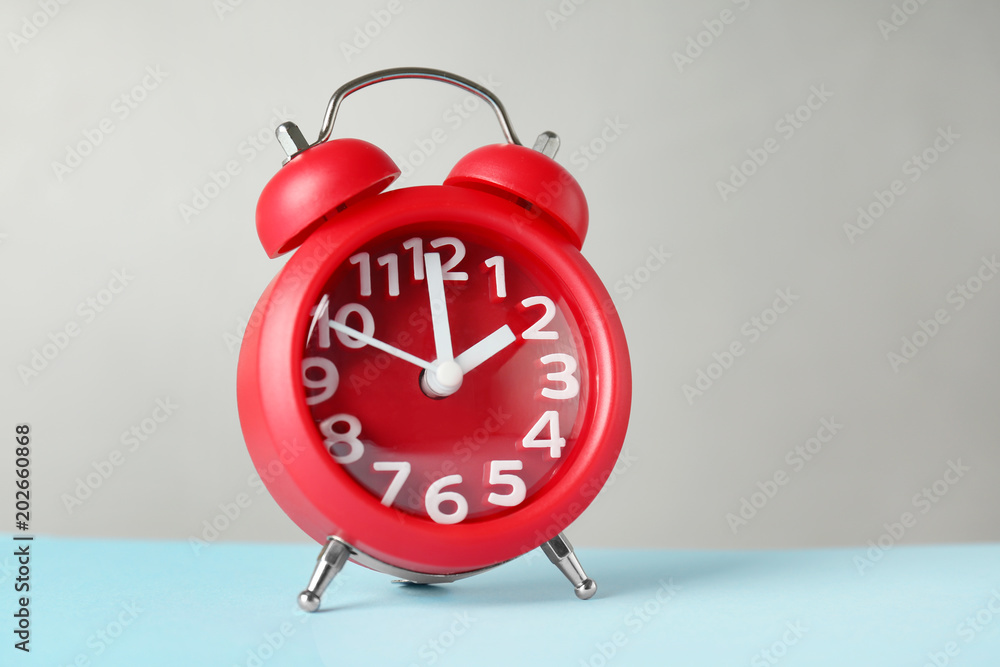 Poster alarm clock on table. time change concept