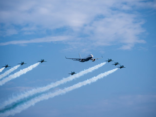 Fototapeta na wymiar Airplanes in formation during an airshow