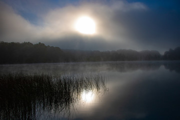 Sunrise Over Foggy Lake
