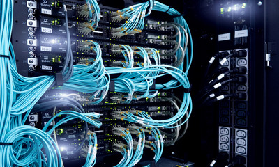 MOSCOW, RUSSIA - April 27: Fibre Channel swich. Severs computer in a rack at the large data center.  Fiber Optical connector interface. Editorial - obrazy, fototapety, plakaty