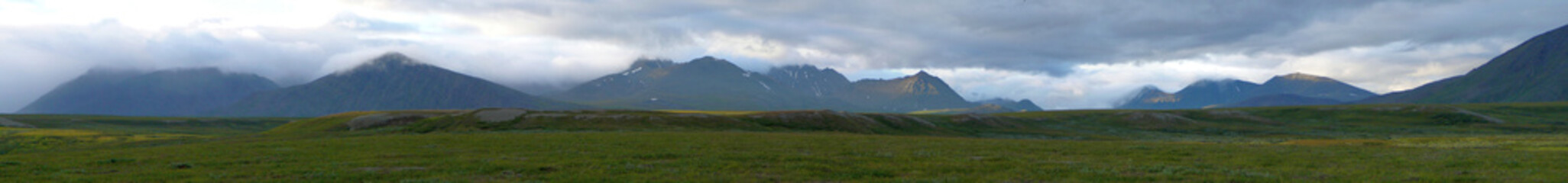 Tundra, mountains and clouds