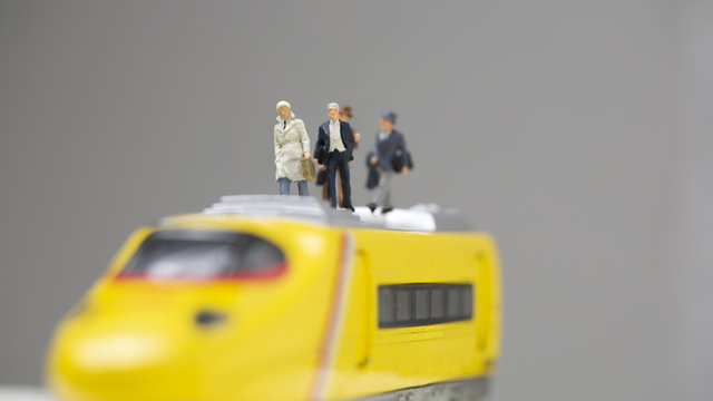 Business Opportunity Concept, Team Of Miniature Businessman On Top Of Train, Looking Forward Seeking For Investment Of New Project.