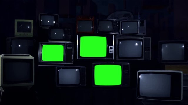Crazy 80s Tvs with Green Screens Turning On and Off. Night Tone.  You can replace green screen with the footage or picture you want with “Keying” effect in AE  (check out tutorials on YouTube).