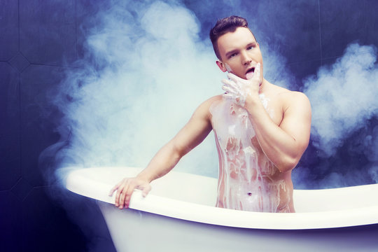  man taking a bath with milk