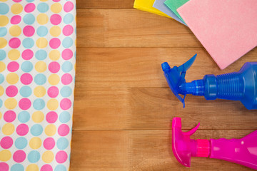 High angle view of spray bottle with wipe pad