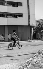 Fototapeta na wymiar man riding his bicycle on the street
