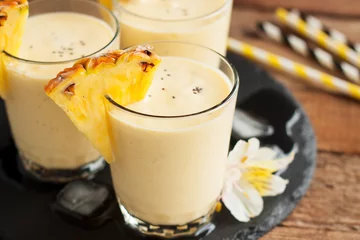 Deurstickers Milkshake Fresh tropical smoothie with ingredients