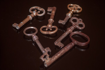 Six old rusty keys