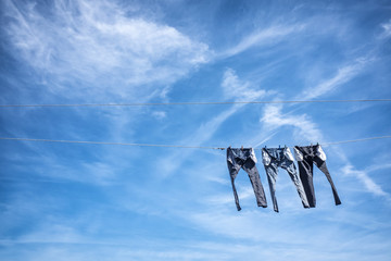 Jeans drying on a clothesline