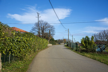 Fototapeta na wymiar Photo of a landscape with road, blue sky and sunlight