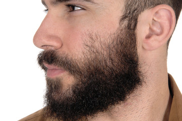 Obraz premium Close up of face of man with beard and mustache