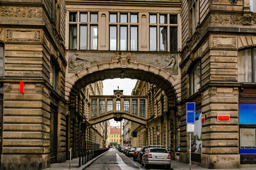 Fototapeta na wymiar Street with crossings between buildings downtown Prague Czech Republic