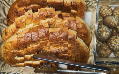 Oat buns and loaf of bread, close-up, view from above